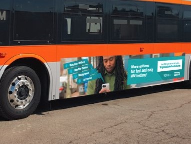 Virginia Gets Tested advertisement banner on the side of a bus