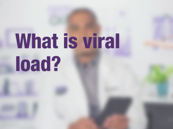 Graphic with purple text "What is viral load?" with doctor in background